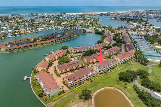 birds eye view of property featuring a water view