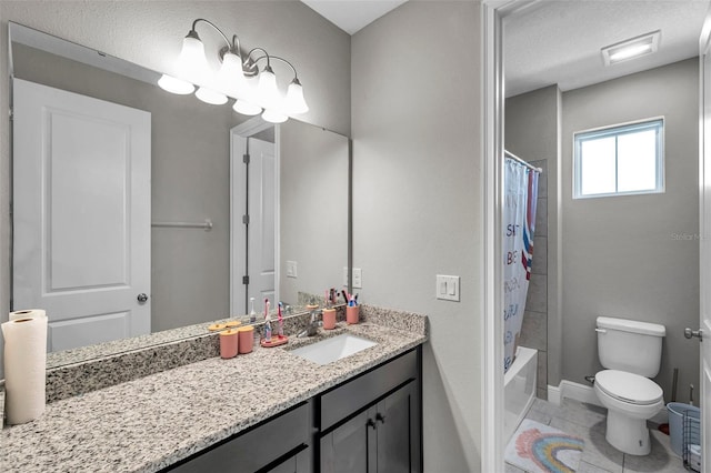 full bathroom featuring shower / tub combo, vanity, toilet, and tile patterned floors