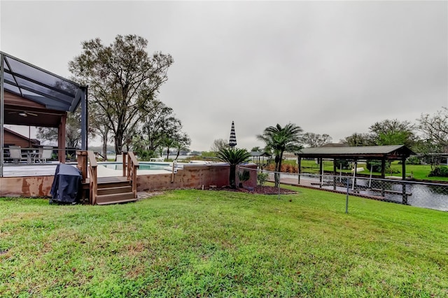 view of yard with an outdoor pool