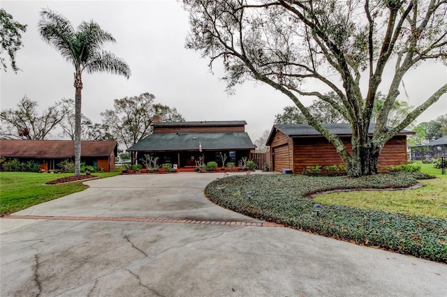 view of property with decorative driveway