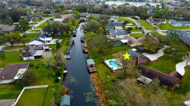 aerial view featuring a water view and a residential view