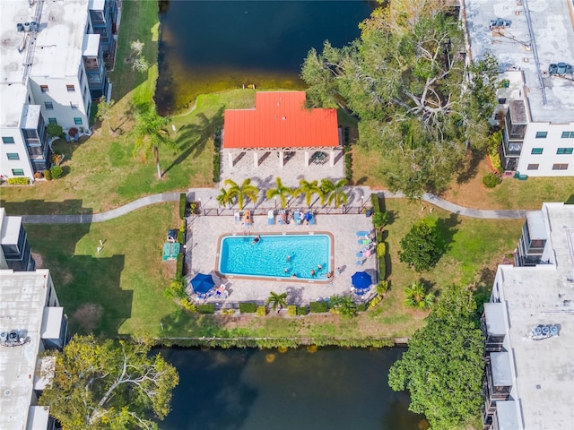 birds eye view of property featuring a water view