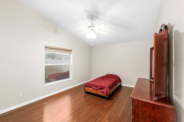 2015 Golf Manor Blvd, Valrico, FL 33596 - bedroom featuring lofted ceiling, baseboards, dark wood-style flooring, and ceiling fan