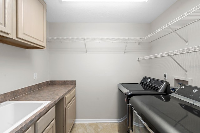 2015 Golf Manor Blvd, Valrico, FL 33596 - laundry area with cabinet space, washer and dryer, baseboards, and a sink