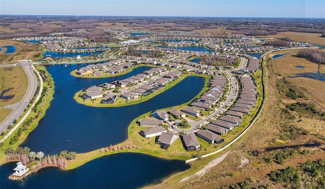 bird's eye view with a water view and a residential view