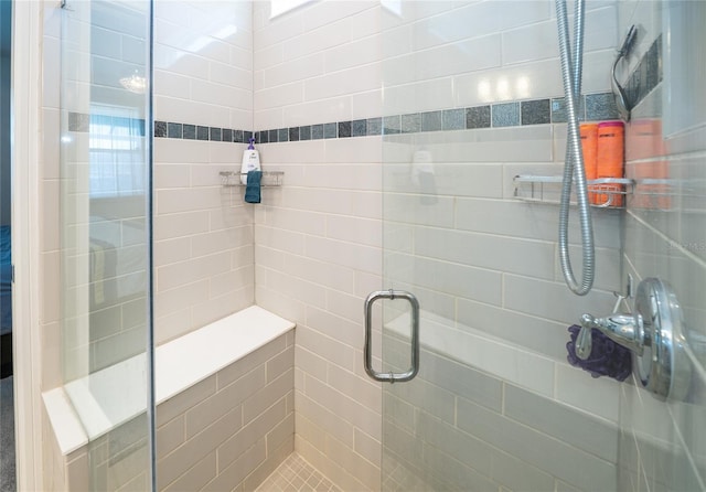 bathroom with a stall shower