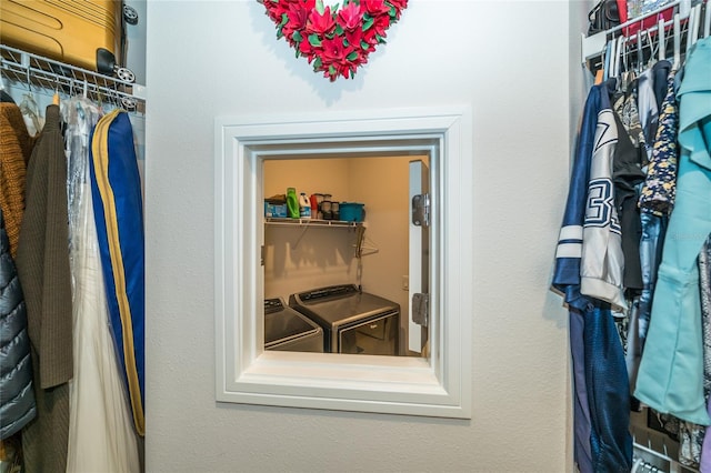 spacious closet with washer and dryer