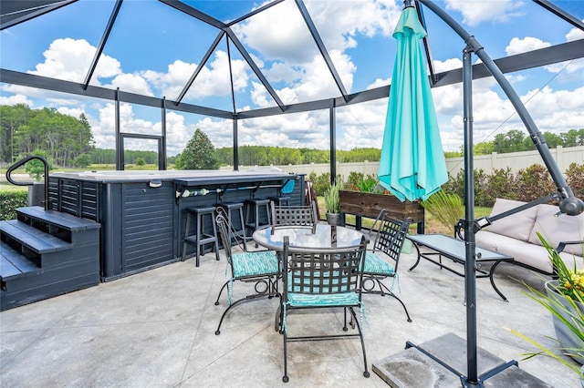 view of patio with outdoor lounge area, a hot tub, outdoor dry bar, and outdoor dining space