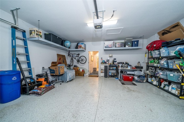 garage featuring a garage door opener