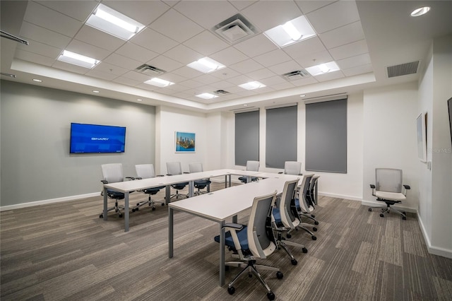 office area with dark colored carpet and visible vents