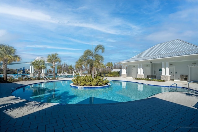 pool featuring a patio area