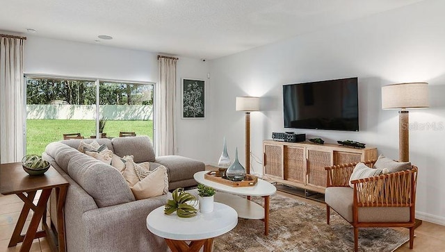 living room featuring a textured ceiling