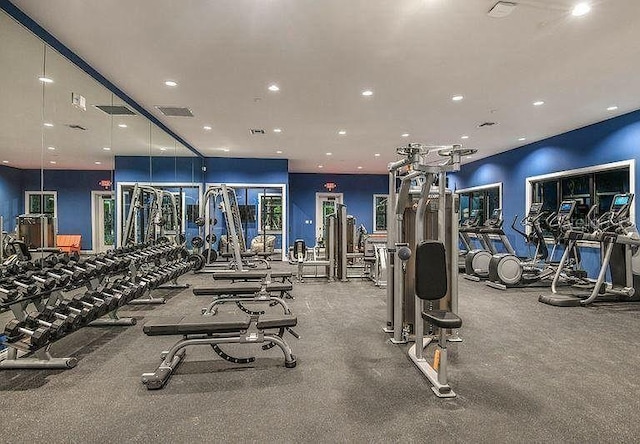 exercise room featuring visible vents and recessed lighting