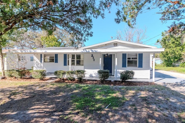 single story home with covered porch