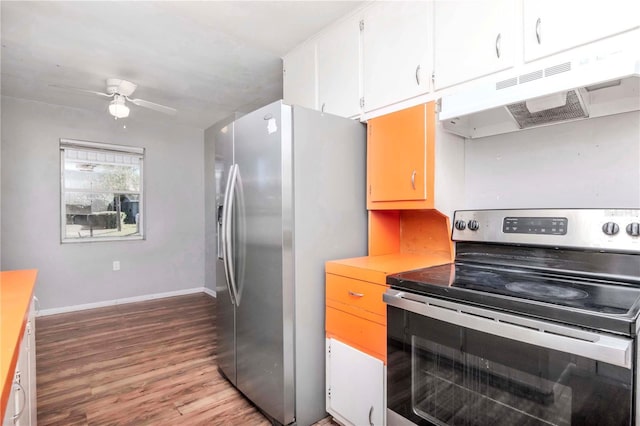 kitchen featuring ceiling fan, stainless steel appliances, white cabinets, and light hardwood / wood-style flooring