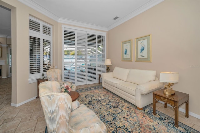 living room with baseboards and ornamental molding