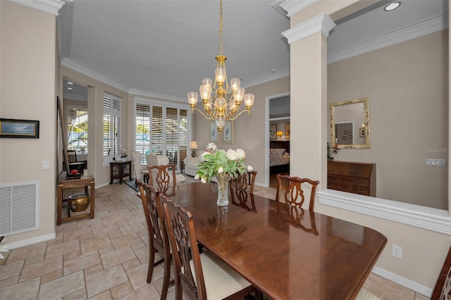 dining room featuring visible vents, crown molding, baseboards, a notable chandelier, and stone finish floor