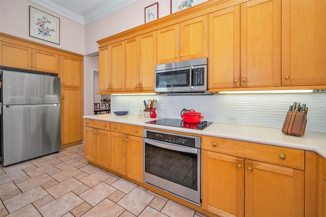 kitchen with light countertops, tasteful backsplash, appliances with stainless steel finishes, and ornamental molding