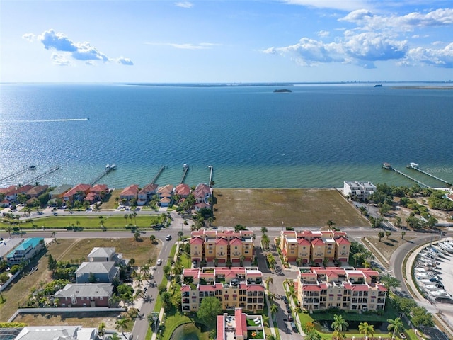 bird's eye view with a residential view and a water view