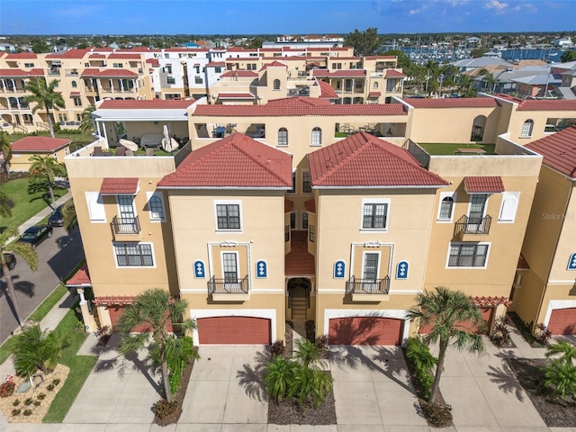 6411 Mayra Shores Ln, Apollo Beach, FL 33572 - view of property featuring driveway, an attached garage, and a residential view