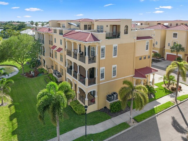 6411 Mayra Shores Ln, Apollo Beach, FL 33572 - view of building exterior with a residential view
