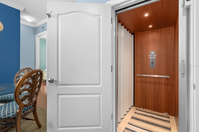 6411 Mayra Shores Ln, Apollo Beach, FL 33572 - elevator with crown molding and recessed lighting