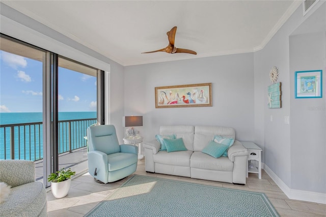 living area with crown molding, visible vents, a water view, ceiling fan, and baseboards