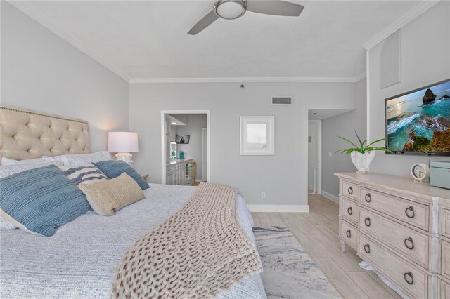 bedroom featuring a ceiling fan, baseboards, visible vents, light wood-type flooring, and crown molding