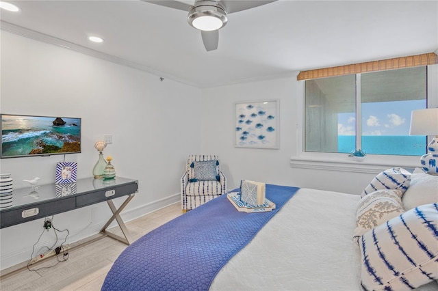 bedroom featuring recessed lighting, ornamental molding, ceiling fan, wood finished floors, and baseboards