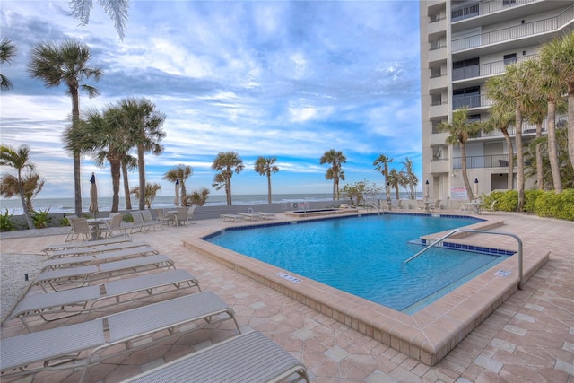 pool with a patio