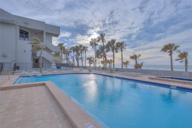 pool with a patio