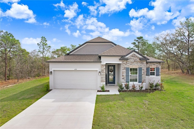 view of front of property featuring roof with shingles, concrete driveway, an attached garage, stone siding, and a front lawn