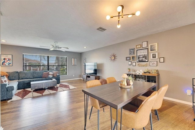 811 Eagle Ln, Apollo Beach, FL 33572 - dining room featuring light wood finished floors, ceiling fan, and recessed lighting