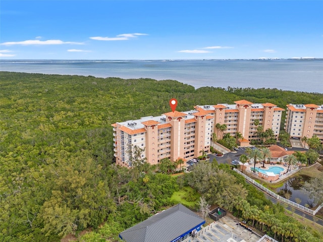 birds eye view of property featuring a water view