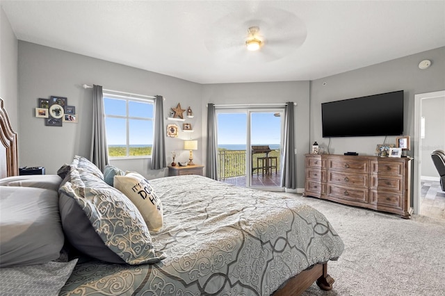 bedroom featuring carpet, access to outside, baseboards, and a ceiling fan