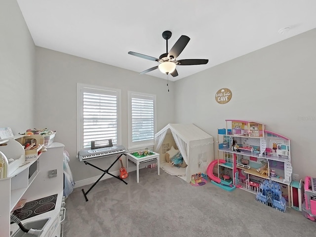 rec room featuring ceiling fan and light colored carpet