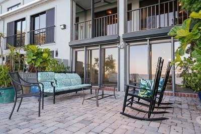 patio terrace at dusk with a balcony