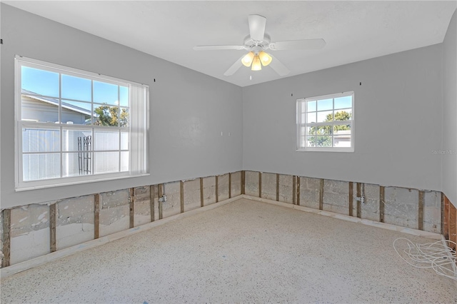 empty room featuring a ceiling fan