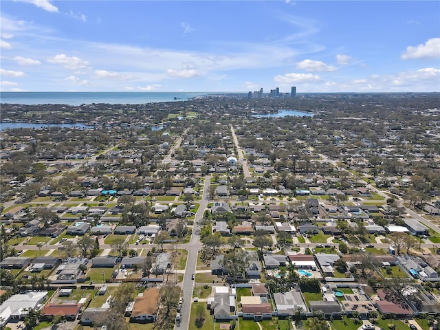 drone / aerial view with a water view and a city view