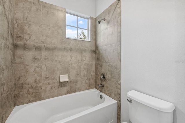 bathroom featuring toilet and shower / bath combination