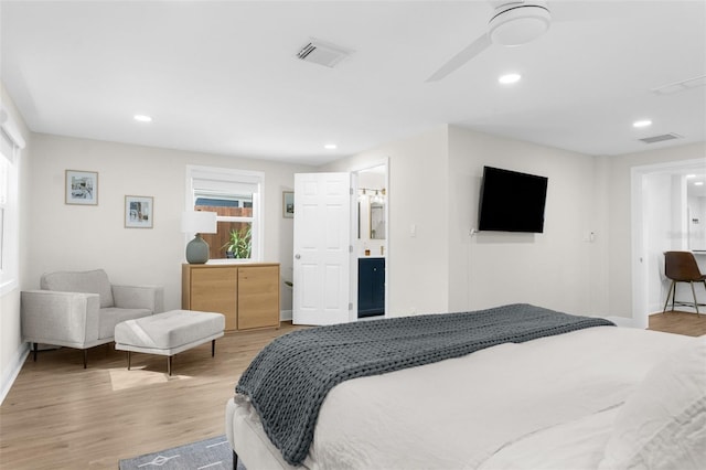 bedroom featuring recessed lighting, visible vents, and light wood-style flooring