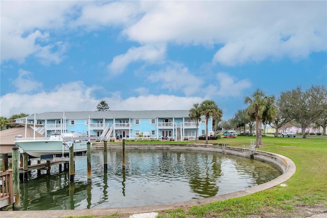 exterior space with a dock and boat lift