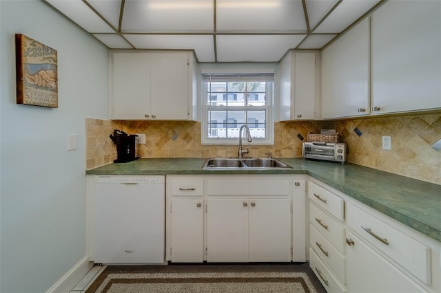 131 Bluff View Dr Unit 208, Belleair Bluffs, FL 33770 - kitchen featuring dishwasher, dark countertops, white cabinets, and decorative backsplash