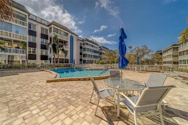131 Bluff View Dr Unit 208, Belleair Bluffs, FL 33770 - community pool with a patio