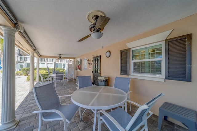 131 Bluff View Dr Unit 208, Belleair Bluffs, FL 33770 - view of patio with outdoor dining space and ceiling fan
