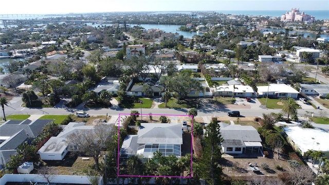 birds eye view of property featuring a water view and a residential view