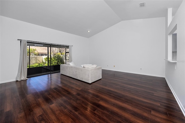 unfurnished living room with lofted ceiling, baseboards, visible vents, and dark wood-style flooring