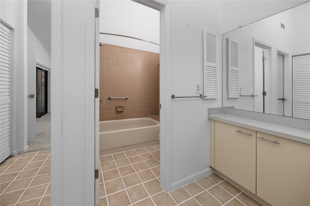 full bath with visible vents, baseboards, tile patterned floors, vanity, and shower / bathing tub combination