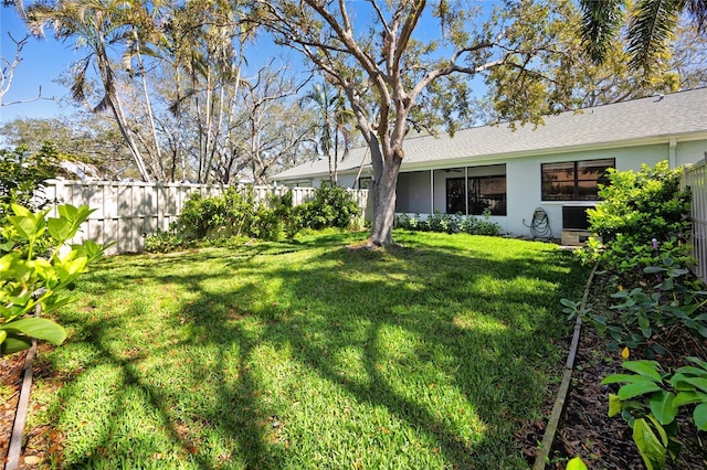 view of yard with fence