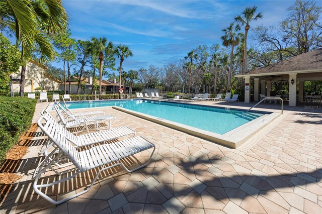 pool featuring a patio area